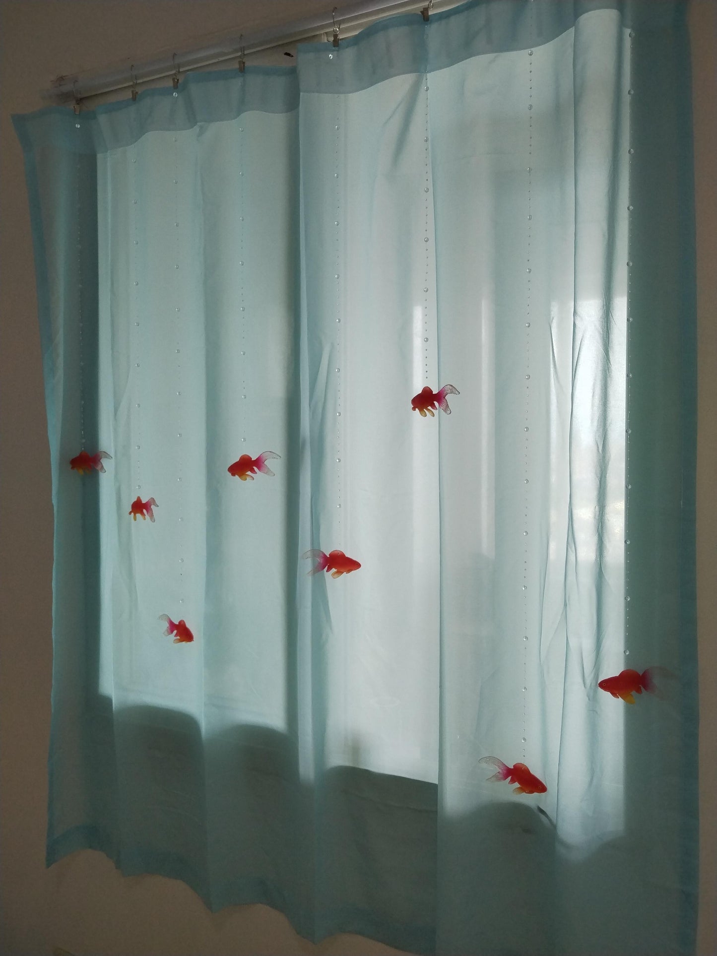 Handmade Goldfish curtains.