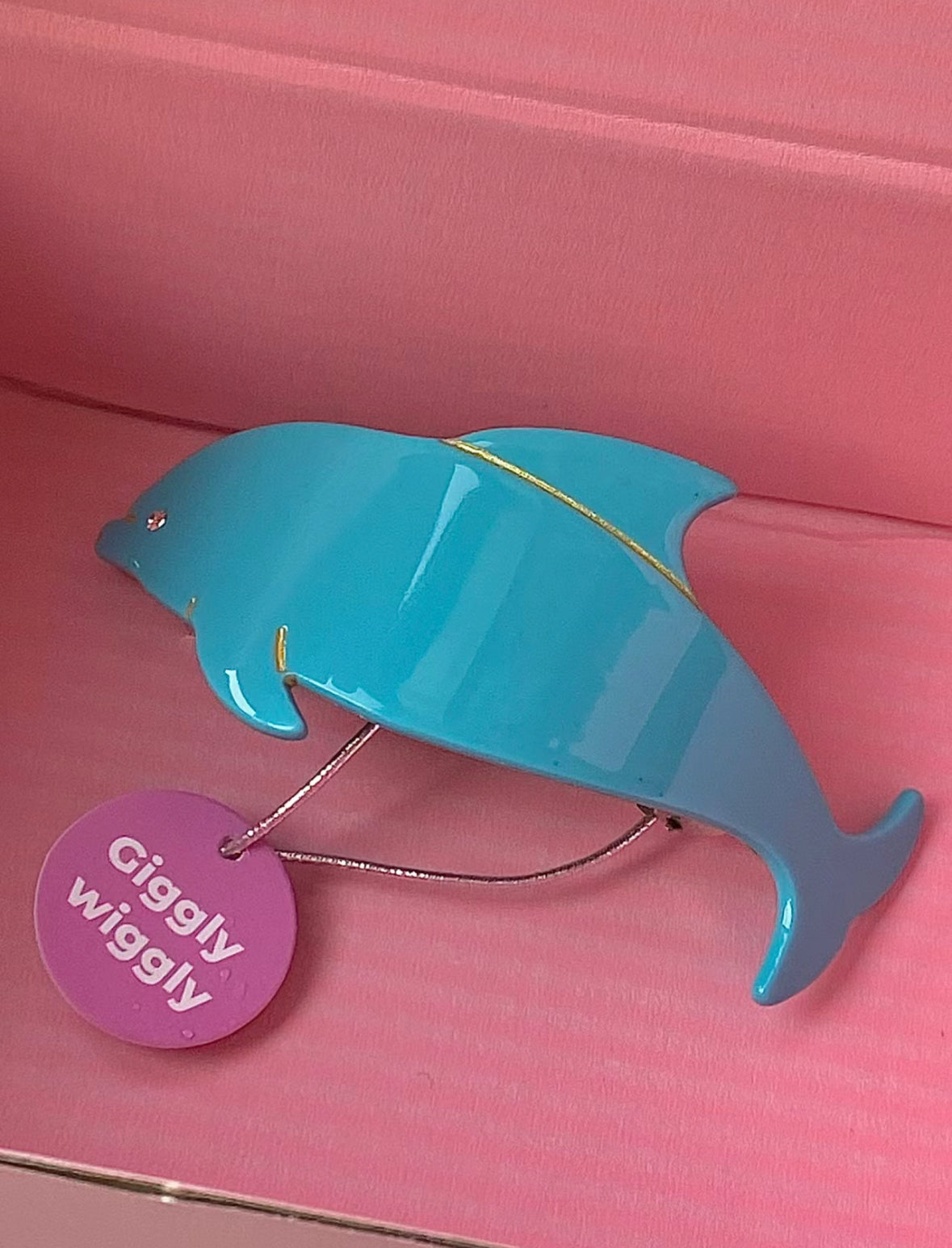 Dolphin hair clip.