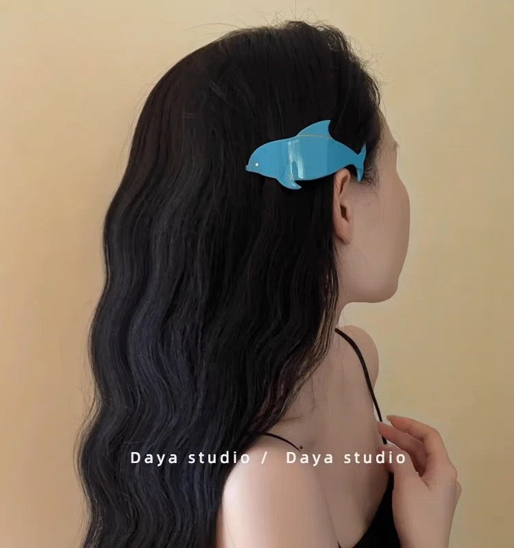 Dolphin hair clip.