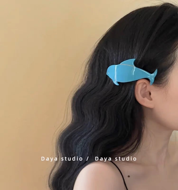 Dolphin hair clip.